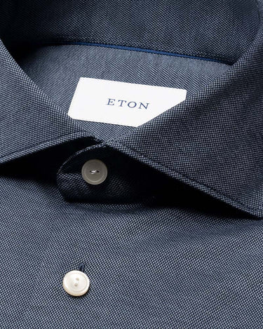 Close-up of a Eton Filo di Scozia Jersey Slim Fit Shirt collar with a white neck label reading ETON and white buttons.