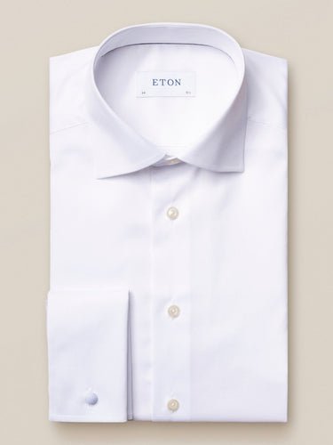 A white, slim fit, French cuff twill shirt by ETON, displayed against a neutral background.