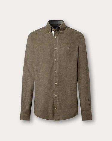 A long-sleeve Hackett Multi Trim Flannel Shirt in Green fabric, featuring a small embroidered cross logo on the left chest, displayed on a light beige background.