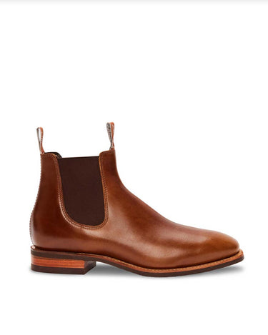A brown leather R. M. Williams Comfort Craftsman Boot with a elastic side panel and a low heel.