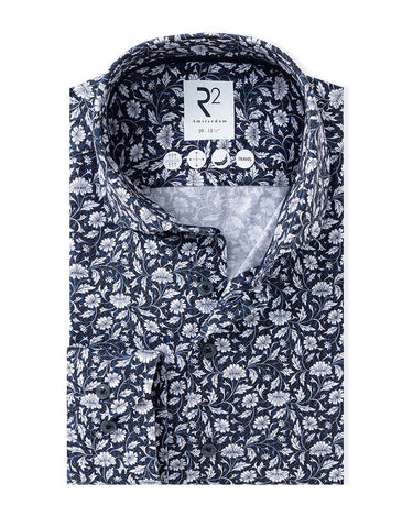 A folded R2 Modern Fit Travel Shirt, Navy Print and white floral pattern, featuring a visible collar label for 'R2 Unlimited'.