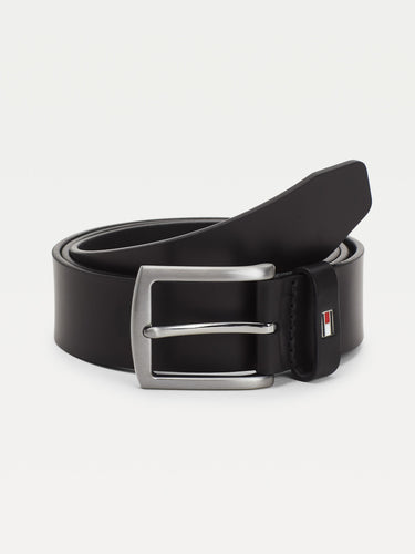 A Tommy Hilfiger Denton Leather Belt, Black with a metal buckle, displaying the Tommy Hilfiger brand logo.
