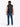 Person wearing a Tommy Hilfiger Packable Quilted Gilet, Black over a pink shirt with blue jeans on a white background