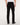 Rear view of a person wearing 7 For All Mankind Slimmy Jeans, Black with a white shirt and black shoes, photographed against a clean white studio background.