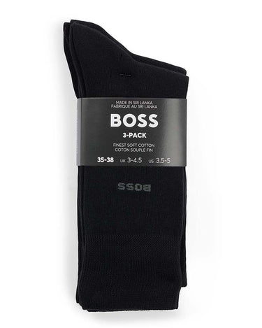 A 3-pack of black BOSS cotton socks folded together with a dark gray paper band label, shown on a plain white background.