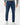 Person wearing Brax Cadiz Straight Fit Jeans, Blue and white sneakers on a white background