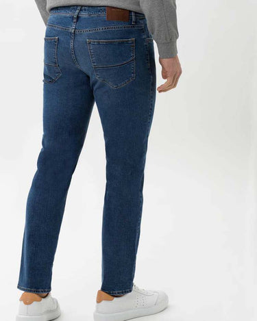 Person wearing Brax Cadiz Straight Fit Jeans, Blue on a white background