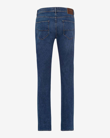 Back view of a pair of Brax Cadiz Straight Fit Jeans, Blue Used on a light gray background.