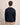 A man viewed from behind wearing a Bugatti Organic Cotton Crew Neck, Navy sweater and beige trousers, standing against a plain beige studio background.