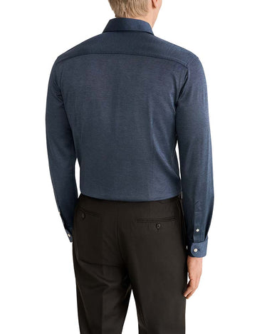Rear view of a man wearing a Eton Filo di Scozia Jersey Slim Fit Shirt and dark trousers against a plain white background.
