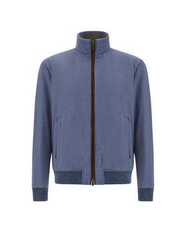 A Paul & Shark Typhoon Bomber Jacket, Indigo Blue with a stand-up collar, featuring a dark brown zipper, zippered side pockets, and ribbed cuffs and hem, shown against a plain white background.