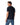 A man wearing a R.M. Williams Parson T-Shirt, Navy and blue jeans, shown from a three-quarters back view against a plain white background.