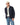 A man wearing a R.M. Williams Rydal Padded Jacket, Navy, a white button-down shirt, blue jeans, and a beige baseball cap, standing against a solid white background.