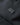 Close-up of a Strellson Finlay Flex City Coat, Dark Blue fabric with a rectangular black metal brand plaque on the chest. The plaque is embossed with the brand name 'ST.