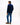 A man wearing a Tommy Hilfiger Fine Corduroy Shirt in Navy, blue jeans, and brown suede boots, shown from a rear three-quarter view against a plain white studio background.